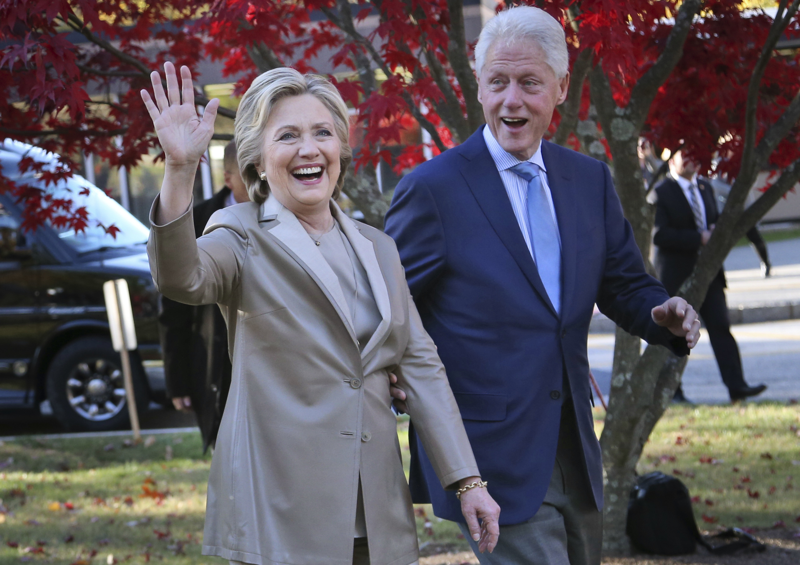 Hillary Clinton (l), Bill Clinton (r)